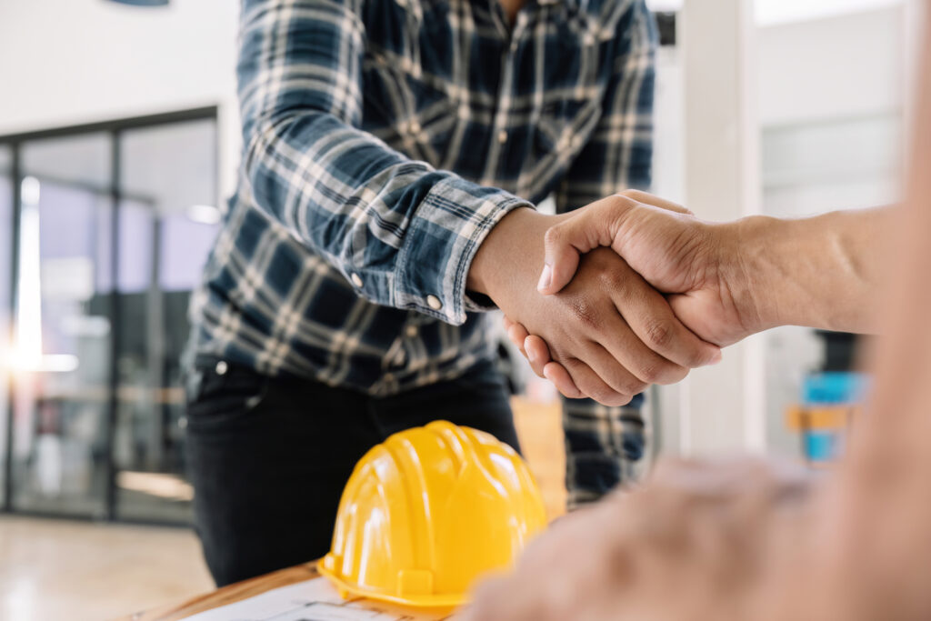 Permeation Grouting New York - A Contractor Shaking Hands with a Homeowner