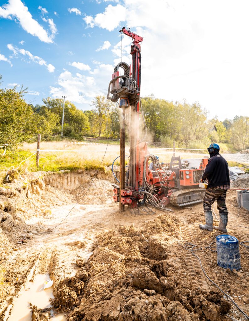 Ground Improvement Techniques - A Contractor Drilling a Helical Piles Into the Ground with a Crawler Drill Rig