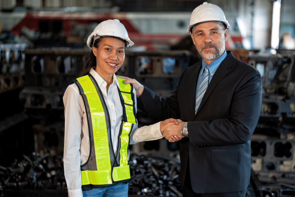 Foundation Support Systems New York - A Construction Company Owner Shaking Hands with a Maintenance Worker