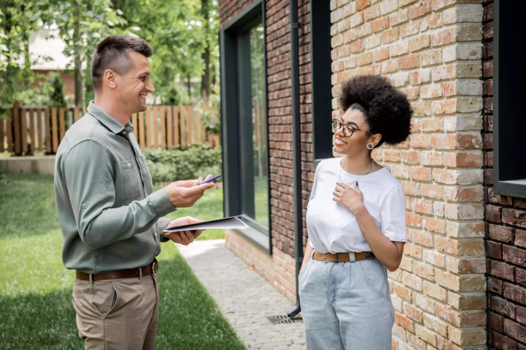 Free Foundation Inspections - A Foundation Inspector Speaking with a Business Owner