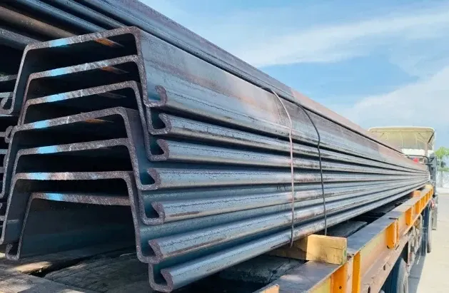 What is a Sheet Pile - A Truckload of Steel Sheet Piles Showing the Grooves That Connect Them Up-Close