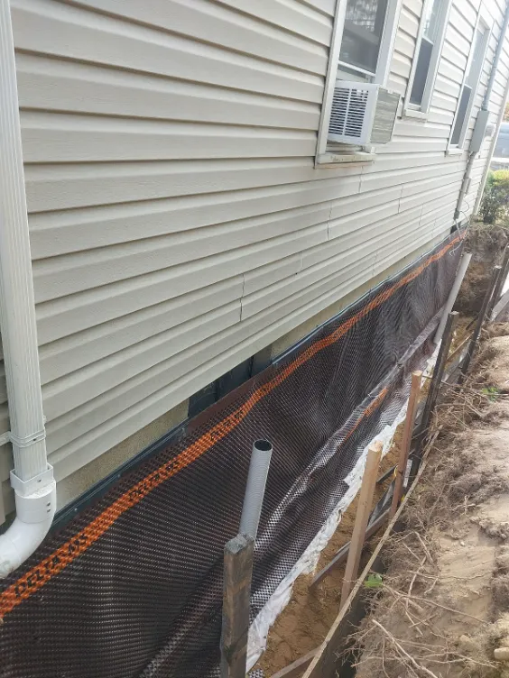 Basement Wall Braces - A House Being Finished Off After Bracing Walls