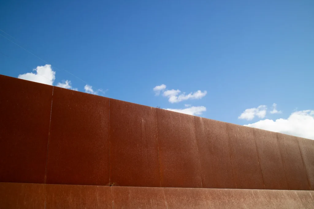 Corten Steel Retaining Wall Guide - A Corten Retaining Wall Surrounding a Commercial Property