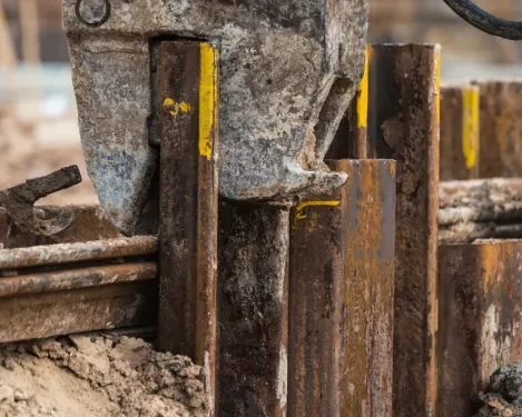 Steel Retaining Wall - A Sheet Pile Wall Being Installed