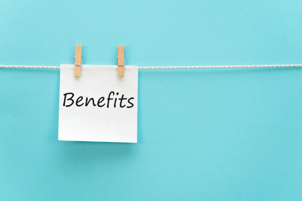 Retaining Wall Design - A Benefits Sign Hanging on a String on a Blue Background