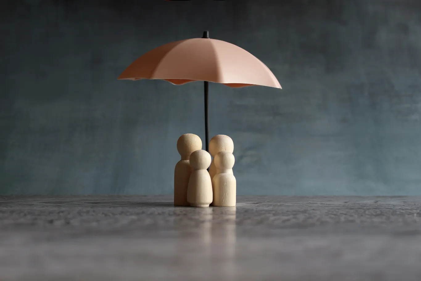 Temporary Water Barriers - A Small Umbrella Over People Icons to Protect Them